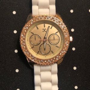Charming Charlie Gold with white wristband watch